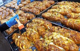 (ویدئو) نان کُره‌ای؛ ترکیبی بی‌نظیر از پنیر، سیر و پیازچه